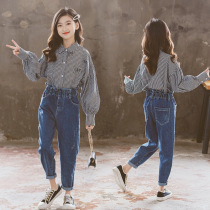 2021 autumn girls net red suit Korean childrens black and white lantern sleeve top bud jeans two-piece set
