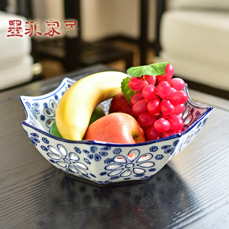 The New Chinese jingdezhen porcelain ceramics hollow - out compote of fruit basin for plate household dry fruit bowl sitting room tea table is received