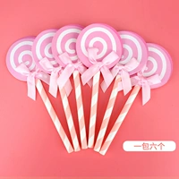 Розовая модель леденца на палочке