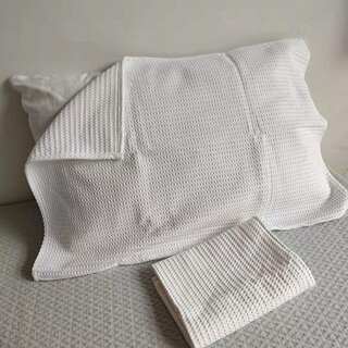 A pair of pure cotton pillow covers are affordable and easy to use