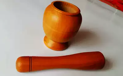 Pure red heart jujube wood garlic pressing machine