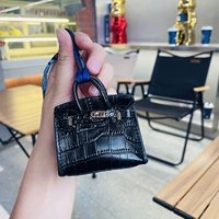 Черная пони, крокодиловый принт