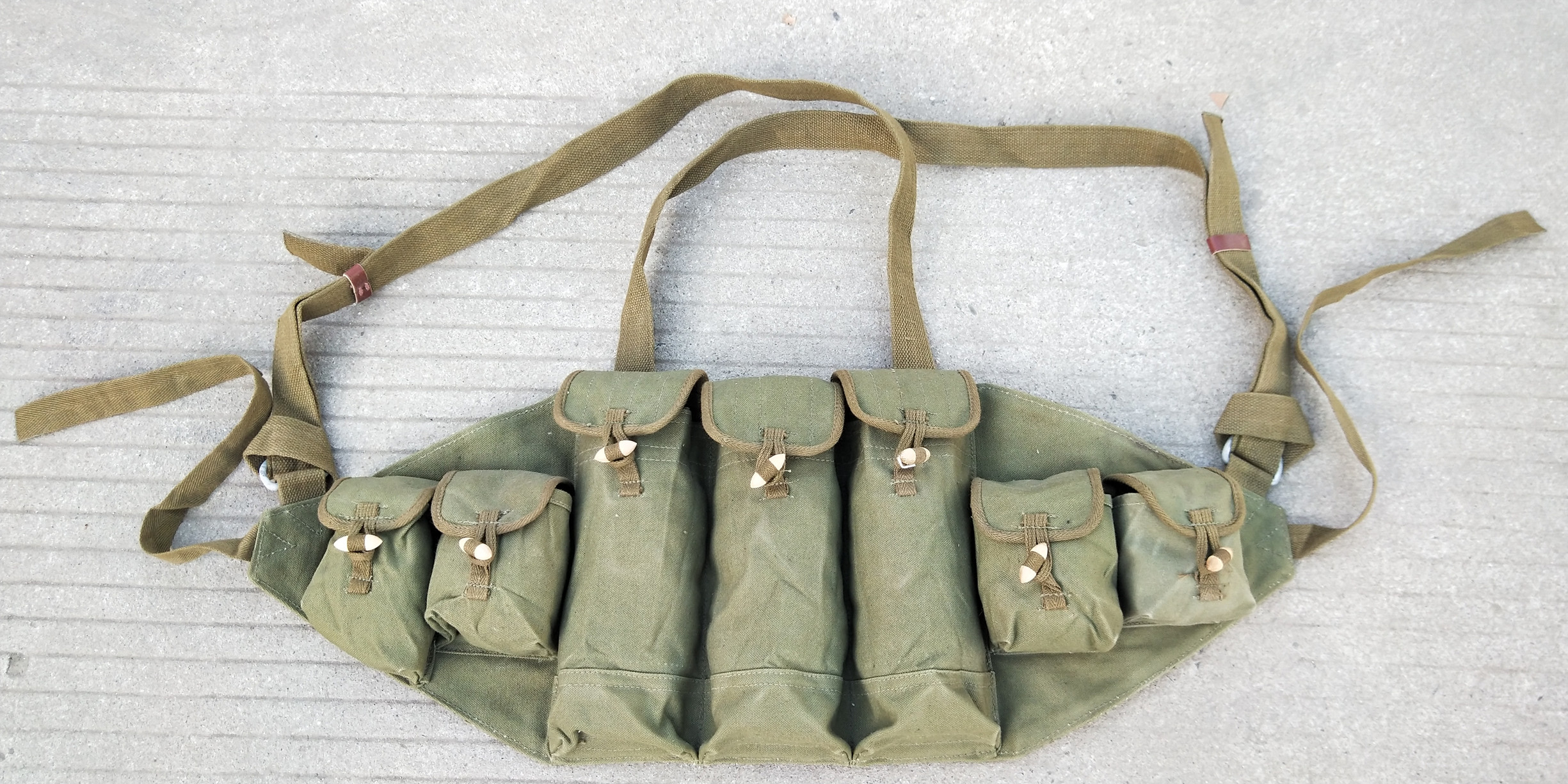 Inventory of old goods 56 punches with carrying tools bullets with chest hanging bags Stage film and television props red collection