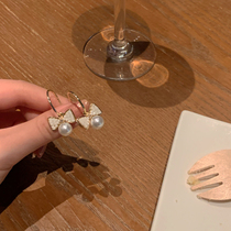 Sweet Pearl bow stud earrings female advanced temperament Joker earrings 2021 new niche design earrings