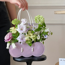 ins Fengyunduo ceramic hand-held flower basket bag vase creative flower arrangement vessel high-looking Chinese Valentines Day flower gift
