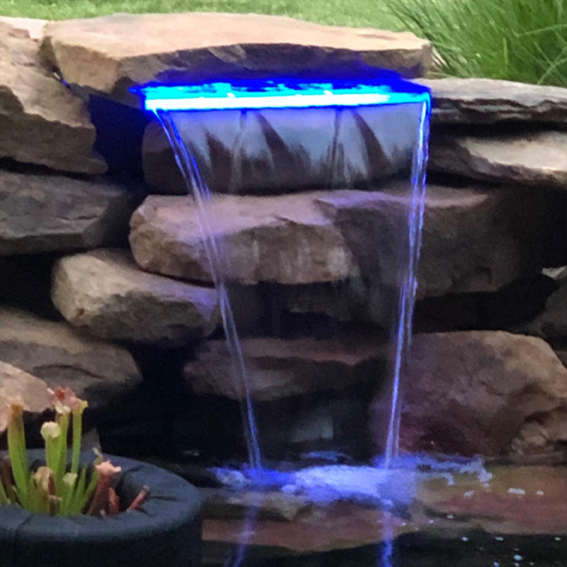 Stainless Steel Waterfall Outlet Light Strip. the Waterfall Outlet Light Requires Its Own Power Supply and Does Not Include a Transformer