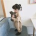 Little Apple 2019 Xuân Mới Trẻ em Hàn Quốc Mặc bé trai và bé gái Dễ thương Quần leo một mảnh - Quần cửa hàng quần áo trẻ em Quần