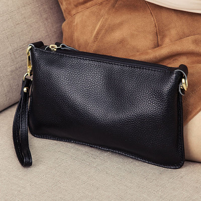 Hong Kong clutch bag 2022 new trendy leather hand bag women's small bag clutch bag soft leather simple mini small shoulder bag