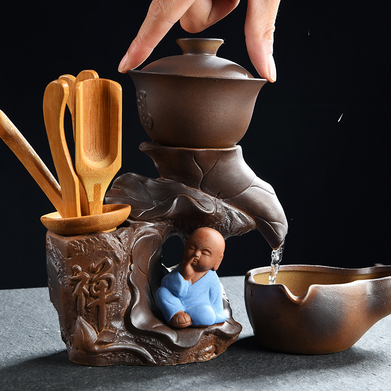 Howe auspicious lazy half automatic creative Shi Mopan kung fu tea, purple sand tea set of household ceramic teapot