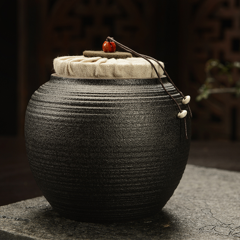 Howe auspicious tea caddy fixings of black crude pottery large firewood sealed as cans ceramic wake pu 'er tea caddy fixings