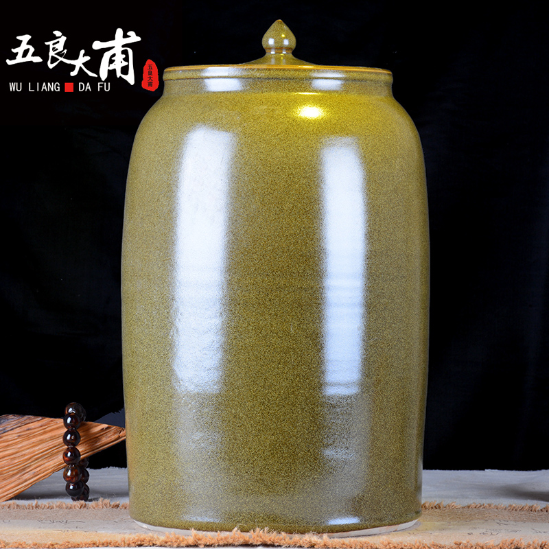 Ceramic jars it oil cylinder storage tank 30 jins 50 kg 100 jins of the big bucket of tea at the end of the cylinder with the tap