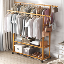 Clothing rack on the floor underwear frame with outdoor clothes on the shelf of the cold clothes on the shelf of the garment frame