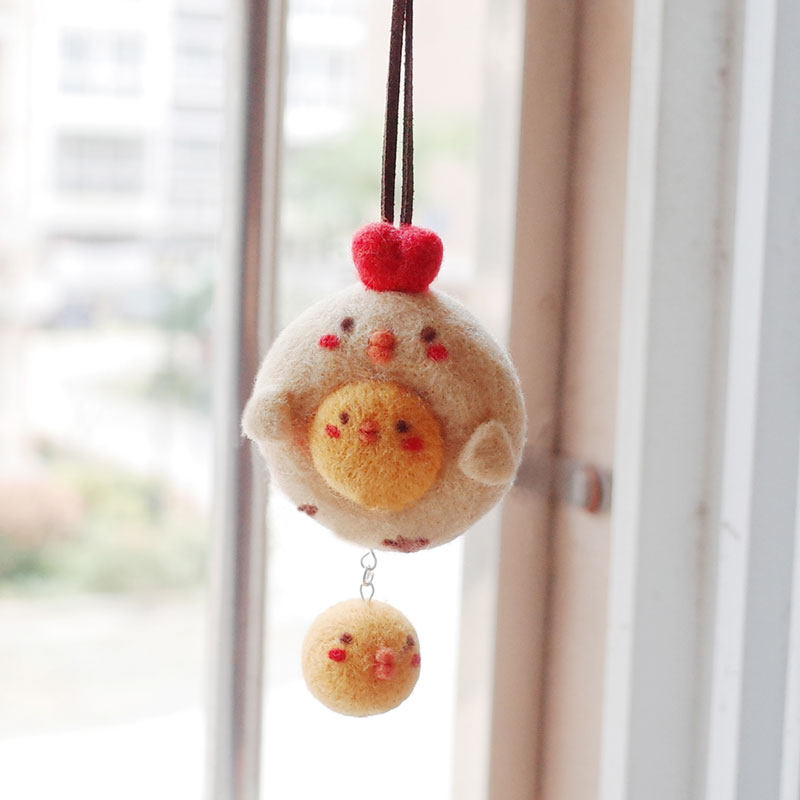 April hand made of wool felt DIY handmade with green amniotic wool felt material bag hug with small yellow cock car pendant