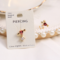 South Koreas new titanium steel spiral studs Cupid earrings female red zircon Angel screws earrings ear bone nails women
