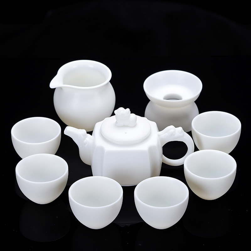 A complete set of ceramic kung fu tea set household dehua white porcelain suet jade porcelain tea set the teapot teacup GaiWanCha sea