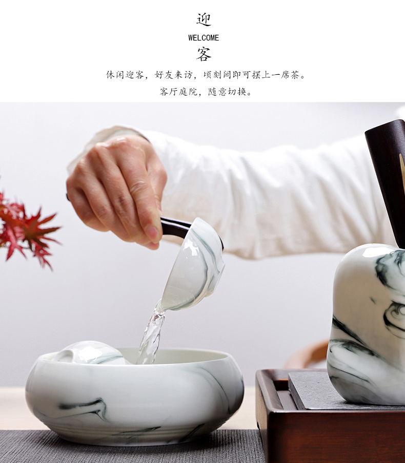 A complete set of ceramic kung fu tea set suits for Chinese style household hand - made teapot teacup tureen tea caddy fixings ink wind