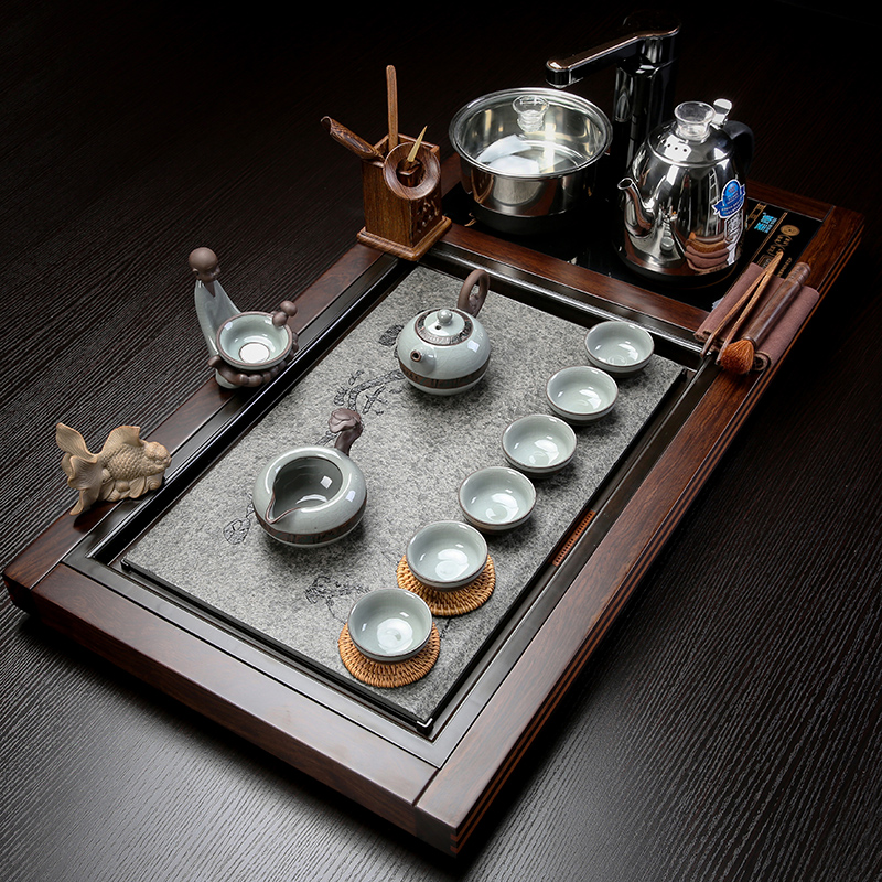 Fully automatic four unity tea set of household solid wood, stone tea tray was kung fu of a complete set of violet arenaceous ceramic cups of tea