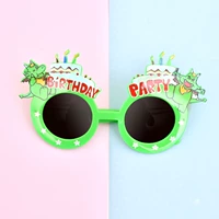 Зеленый мультяшный динозавр, очки