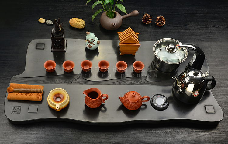 Purple sand tea set the beginning day, kung fu suit the joining together of four automatic intelligent stone tea tray annatto tea pot of tea