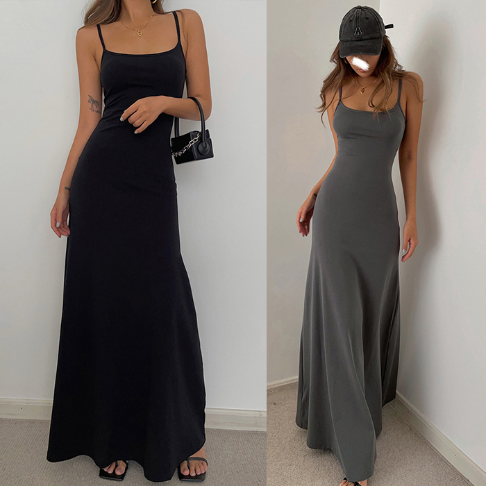 Mid-Length Solid Color Tank Top Dress with a Cinched Waist, A-Line Silhouette, and Large Skirt Hem, Suitable for a Trendy, Edgy Style