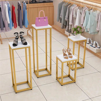 Window raised four-piece set of flowers bags shoes and hats clothing running water station flower stand cosmetics display stand