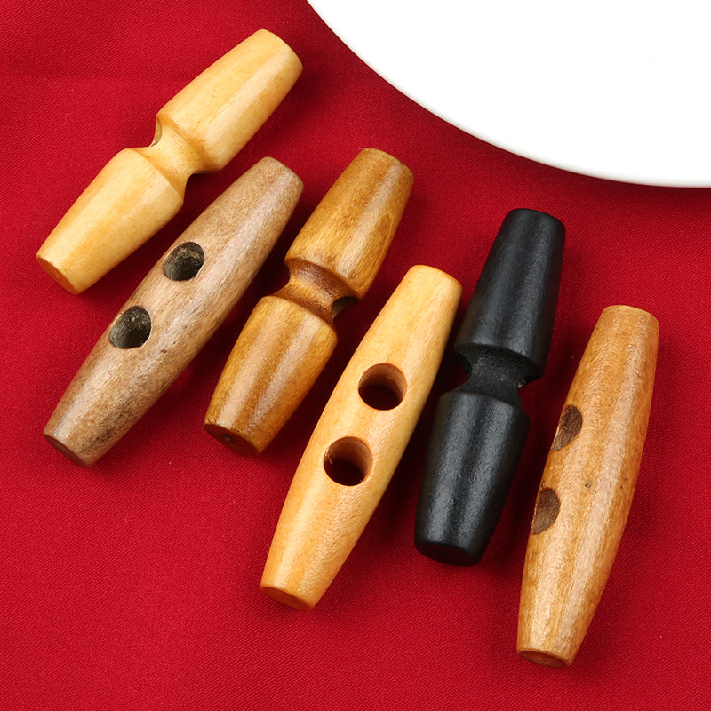 木製ホーンボタン、オリーブボタン、コート、トレンチコート、カシミヤセーター、ジャケット用の無垢材ボタン。ダブルボタン留め。