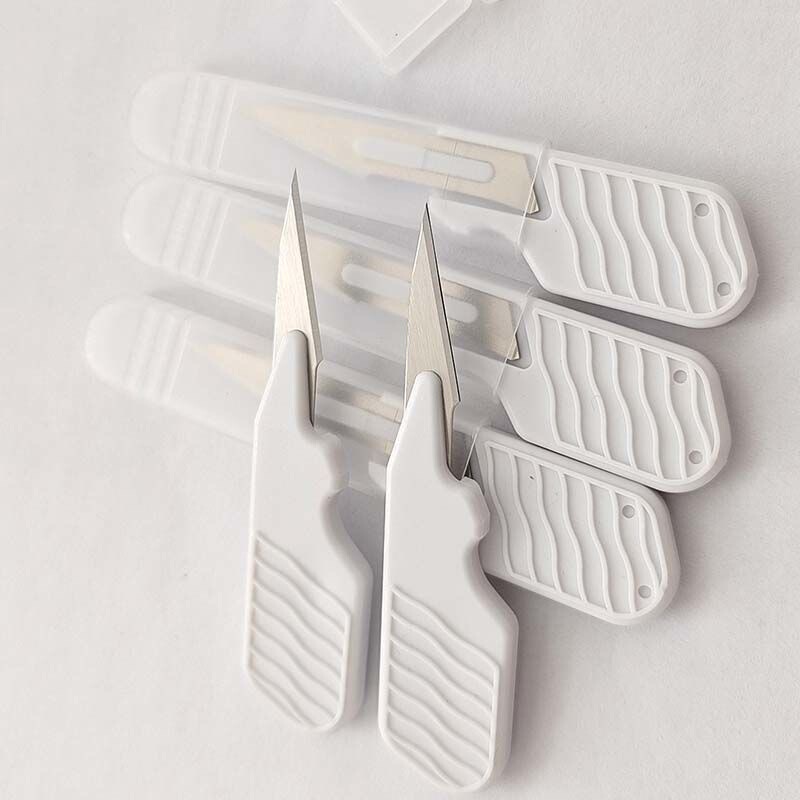 Surgical Blade No. 11, Extra Sharp Plastic Trimming and Cutting Knife for Paper Carving, Thumb Plastic Surgical Knife with Short Plastic Handle Surgical Blade No. 11, Extra Sharp Plastic Trimming and Cutting Knife for Paper Carving, Thumb Plastic Surgical Knife with Short Plastic Handle