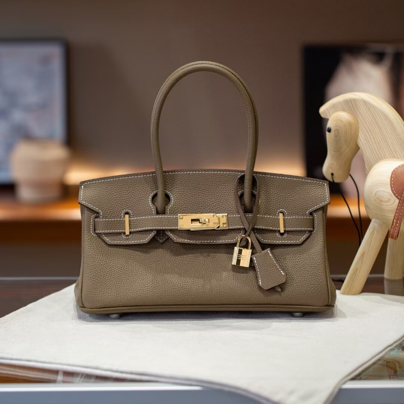Togo First-Layer Cowhide Horizontal Style Platinum Bag for Women, High-End Genuine Leather Silver Buckle Long Kelly Bag, Hand-Held Tote Bag Togo First-Layer Cowhide Horizontal Style Platinum Bag for Women, High-End Genuine Leather Silver Buckle Long Kelly Bag, Hand-Held Tote Bag