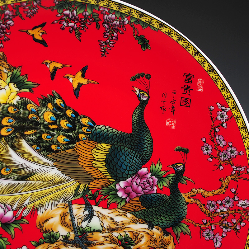 The peacock figure hanging dish decorative porcelain jingdezhen ceramics sit plate wall of sitting room home Chinese handicraft furnishing articles