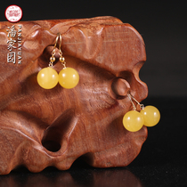 Panjiayuan Natural beeswax round beads inlaid with gold earrings