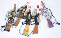 Old tin toy gun nostalgic old object childrens submachine gun sound window display old thing antique decoration