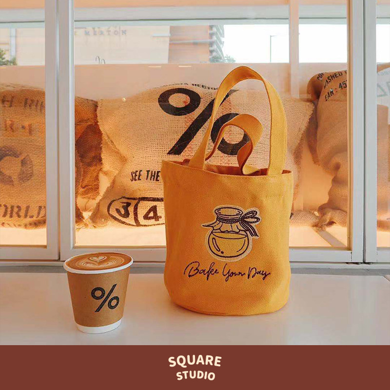(Square Studio) Honey Embroidered Canvas Bag Bakery Mini Joker Hand Carrying Storage Barrel Bag