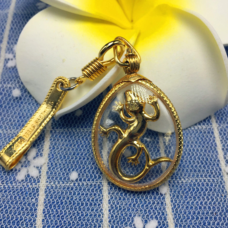 Thailand's Buddhist dragon Bornaba bay gold and silver bifacial double tailed gecko