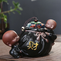 Ceramic little monk tea pot black pottery tea storage pot creative purple sand pig portable small sealed can kung fu tea set