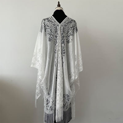 The 2026 new summer style of cheongsam shawl pairs well with the sun protection fringed summer women's thin lace shawl for summer