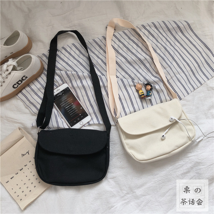 Hong Kong style literary messenger bag female Korean version student solid color canvas bag female Japanese Harajuku college wind girl small bag