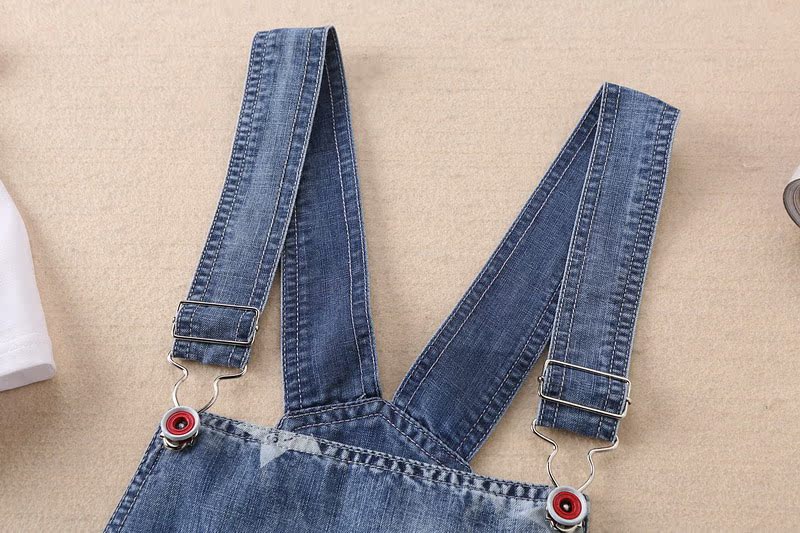 Cô gái denim bib 2018 mới lớn trẻ em mùa hè ăn mặc dây đeo quần short 12-15 tuổi trẻ em mùa hè phù hợp với