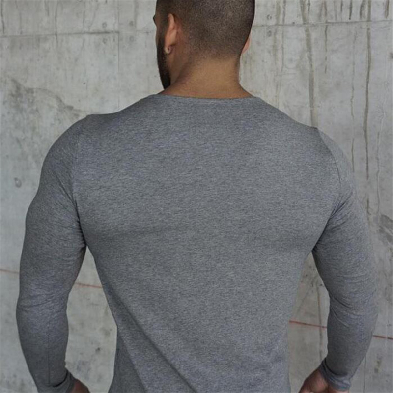 Cơ bắp anh em thể thao áo thun dài tay nam thời trang Slim thun hồ quang hem rắn màu áo sơ mi giản dị áo tanktop nữ