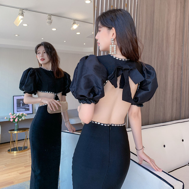 Design sense high waist rhinestone backless black dress Europe and the United States ins minority open waist hollow puff sleeve dress