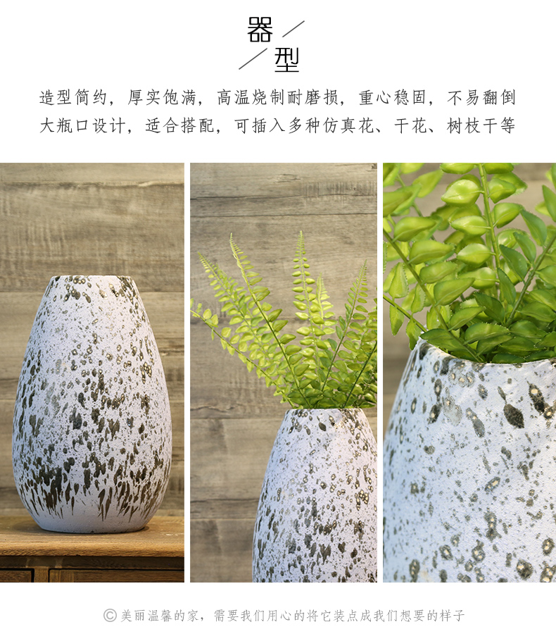 Jingdezhen coarse pottery dated mesa vase teahouse adornment is placed between example simulation flowers floral arrangements