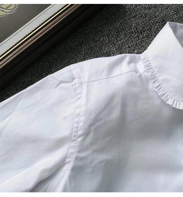 Mùa thu đông mẫu áo sơ mi nữ cộng với áo nhung dày ấm áp màu trắng trang phục học sinh trẻ em chạm đáy áo ren quần áo trẻ em hàn quốc