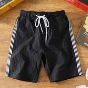 Mùa hè quần lửng đi biển quần short nam phiên bản Hàn Quốc của quần thể thao rộng năm điểm quần trẻ trung phần mỏng