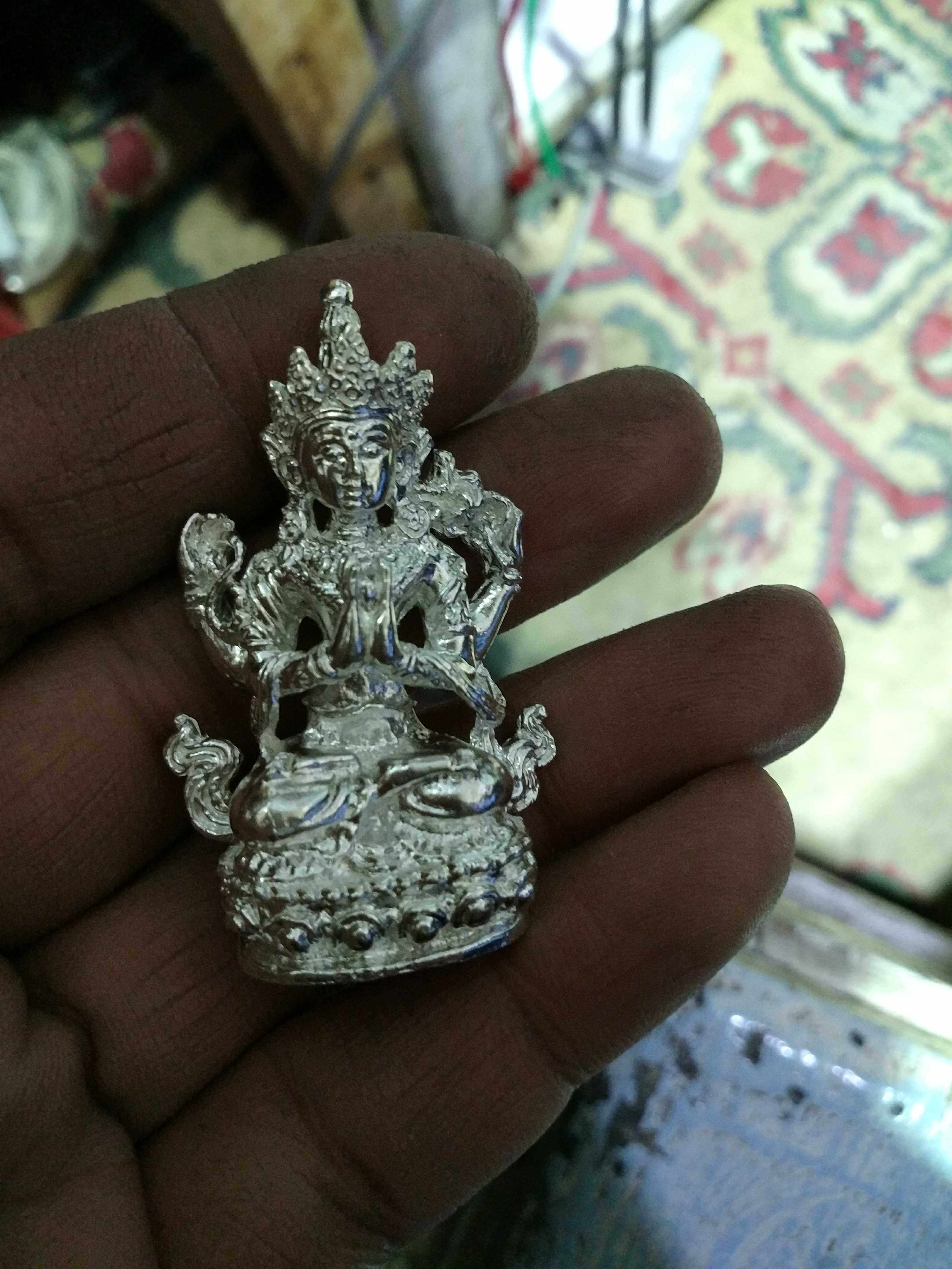 Stop casting (old silver finely-cast four-arm Guanyin) pure silver small Buddha statue with a Buddha's body and a pure silver inch of Buddha