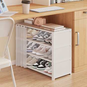 Shoe rack under the dormitory table