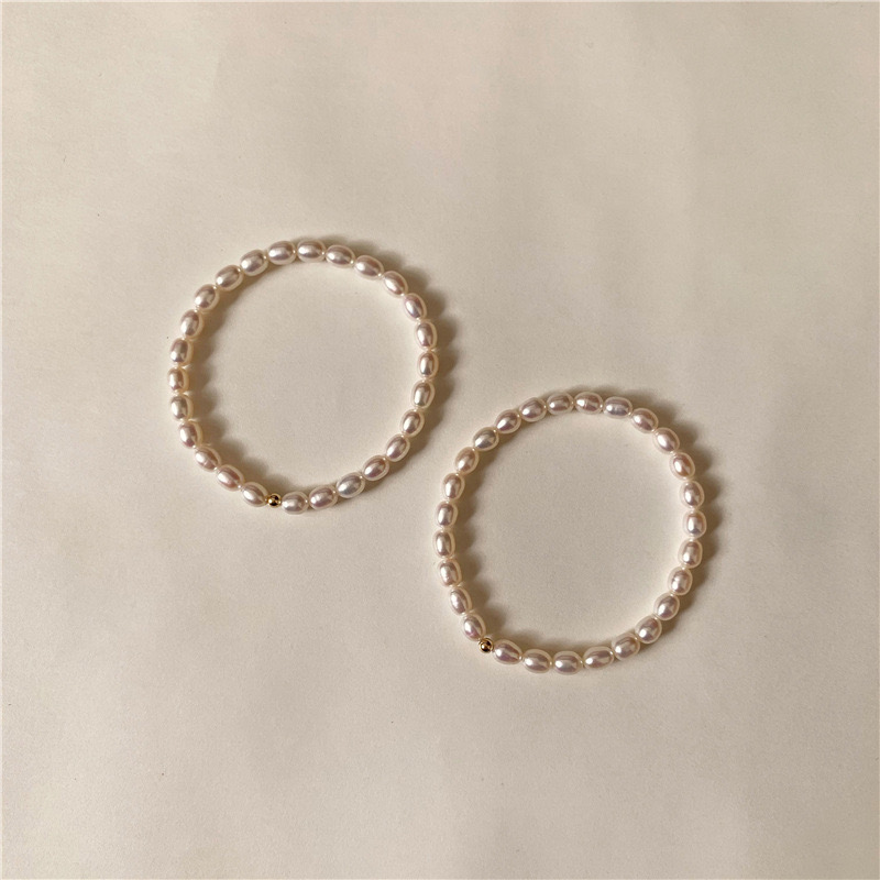 The naturally white - tender baroque natural freshwater pearl bracelet female summer retro minimal design rice - grain string girl