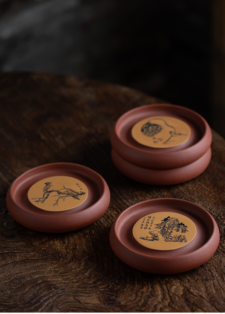 Yixing it bearing Chinese style household kung fu tea tea accessories checking out creative teapots mat base collet