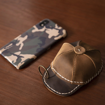 Handmade genuine leather key buckle Bluetooth wireless headphone bag zero wallet card bag coin bag hand carrying cow leather decoration hanging bag