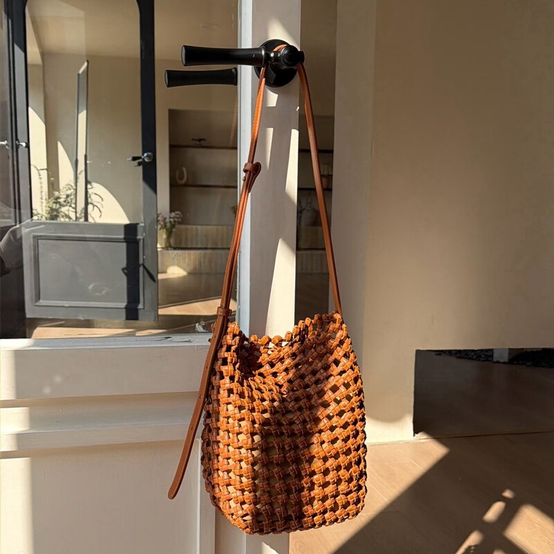 Handmade Leather Hollow-Out Bucket Bag for Women, Versatile Large-Capacity Shoulder and Crossbody Bag, Vacation Style Bucket Bag