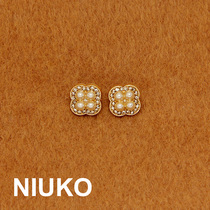 NIUKO new four-leaf straw imitation pearl metal decoration shirt button delicate water drill button sub upscale accessories