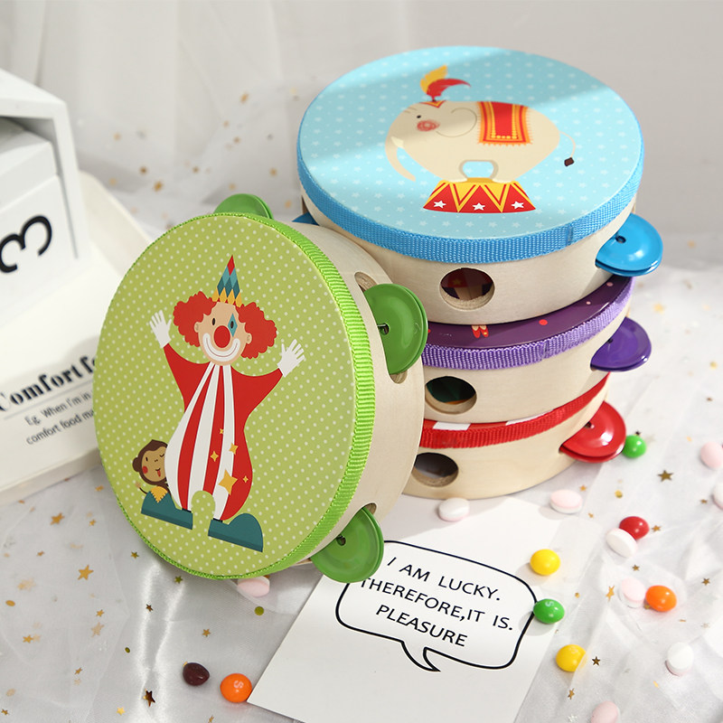 Orff percussion children Xinjiang dance tambourine kindergarten teacher claps the drummer with a hand drummer